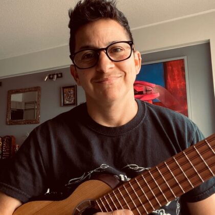 Mar, music teacher, with instrument