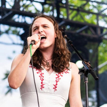 female singing on stage